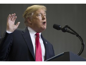 In this Nov. 26, 2018, photo, President Donald Trump speaks at a rally in Biloxi, Miss. Trump said Tuesday, Nov. 27, that he was "very disappointed" that General Motors was closing plants in the United States and warned that the White House was "now looking at cutting all GM subsidies," including for its electric cars program.