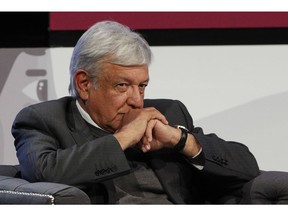 In this Nov. 22, 2018, photo, Mexican President-elect Andres Manuel Lopez Obrador listens during a meeting in Mexico City. Migrants, trade, crime, the border wall: The challenges to the modern U.S.-Mexico relationship have perhaps never been as stark and divisive as they are now, at a critical juncture for both countries.