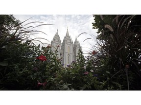 FILE - In this Sept. 14, 2016, file photo, the Salt Lake Temple, is shown, in Salt Lake City. A nationwide survey of midterm voters found that about two-thirds of Mormon voters nationwide favored Republicans in the midterm elections, but approval for President Donald Trump lags behind.