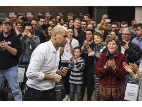 FILE - In this Oct. 28, 2018, file photo, Sen. Cory Booker, D-N.J., exits the stage after speaking at a get out the vote event hosted by the NH Young Democrats at the University of New Hampshire in Durham, N.H. Even before they announce their White House intentions, New Hampshire's ambitious neighbors are in the midst of a shadow campaign to shape the nation's first presidential primary election of the 2020 season.