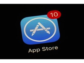 FILE - This March 19, 2018, file photo shows Apple's App Store app in Baltimore. Apple is at the Supreme Court to defend the way it sells apps for iPhones against claims by consumers that the company has unfairly monopolized the market. The justices are hearing arguments Monday, Nov. 26, in Apple's effort to end an antitrust lawsuit that could force the iPhone maker to cut the 30 percent commission it charges software developers whose apps are sold exclusively through Apple's App Store.