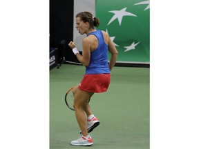 Barbora Strycova of the Czech Republic reacts after scoring a point against Sofia Kenin of the United States during their tennis match of the Fed Cup Final between Czech Republic and United States in Prague, Czech Republic, Saturday, Nov. 10, 2018.