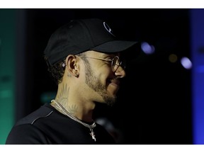 Mercedes driver Lewis Hamilton of Britain arrives for a news conference in Sao Paulo, Brazil, Wednesday, Nov. 7, 2018. 33-year-old Hamilton, who won his fifth title at the Mexican Grand Prix two weeks ago, will compete Sunday in the Brazilian Formula One Grand Prix at Sao Paulo's Interlagos circuit.