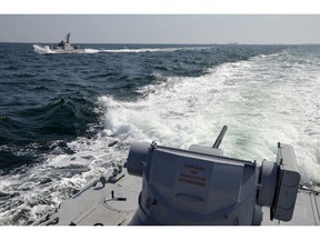 In this file photo taken and distributed by Ukrainian Navy Press Service on Sunday, Nov. 25, 2018, two Ukrainian forces navy ships are seen near Crimea. The Ukrainian navy says a Russian coast guard vessel rammed a Ukrainian navy tugboat near Crimea, damaging the ship's engines and hull. (Ukrainian Navy Press Service via AP)