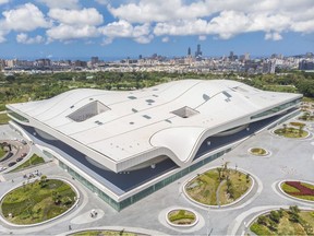 In this undated handout photo provided Nov. 5, 2018, by the National Kaohsiung Center for the Arts, the National Kaohsiung Center for the Arts designed by Dutch architect Francine Houben is seen in Kaohsiung in southern Taiwan. A sprawling complex of four theaters billed as the biggest performing arts center in the world has opened in southern Taiwan. (National Kaohsiung Center for the Arts via AP)