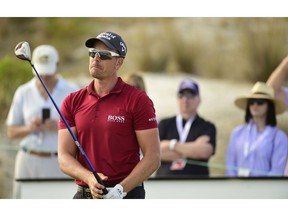 Sweden's Henrik Stenson reacts after hitting from the sixteenth tee during the first round of the Hero World Challenge at the Albany Golf Club in Nassau, Bahamas, Thursday, Nov. 29, 2018.