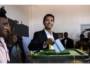 Presidential hopeful Andry Rajoelina, casts his vote at a polling station in Antananarivo, Madagascar, Wednesday, Nov. 7, 2018. Voters go to the polls to elect a president with hopes that a new leader will take the Indian Island nation out of chronic poverty and corruption.