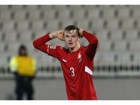 Lithuania's Justinas Janusevskis reacts during the UEFA Nations League soccer match between Serbia and Lithuania at Partizan stadium in Belgrade, Serbia, Tuesday Nov. 20, 2018.