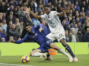 Chelsea's Alvaro Morata, left, duels for the ball with Everton's Yerry Mina during the English Premier League soccer match between Chelsea and Everton at Stamford Bridge stadium in London, Sunday, Nov. 11, 2018.