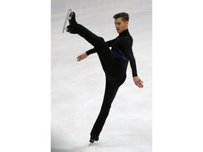 US' Jason Brown competes in the Men Short Program Program during the ISU figure skating France's Trophy, in Grenoble, French Alps, Friday, Nov. 23, 2018.