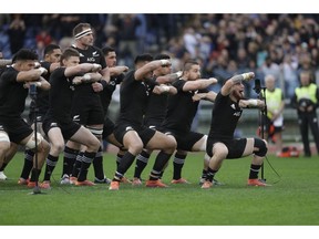 New Zealand's players perform the Haka prior to the start of the rugby union international match between Italy and New Zealand at the Olympic Stadium in Rome, Saturday, Nov. 24, 2018.