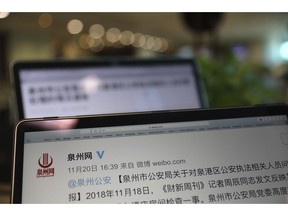 An online post by the Quanzhou police detailing the investigation and an apology for an incident where police personnel let themselves Into the hotel room of Zhou Chen, an environmental reporter for Caixin, seen on computer screens in Beijing, China, Thursday, Nov. 22, 2018. Few journalists in China go public about harassment by authorities, but one has broken the silence and won a rare apology from police.