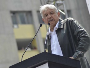 FILE - In this Sept. 29, 2018 file photo, Mexico's President-elect Andres Manuel Lopez Obrador speaks at a rally commemorating the 50th anniversary of a bloody reprisal against students, at the Tlatelolco Plaza in Mexico City. Mexican stocks appeared headed for a second day of losses on Friday, Nov. 9, 2018, after Lopez Obrador floated a proposal to prohibit some commissions charged by private banks.