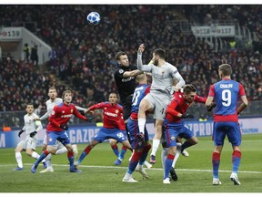 Roma defender Kostas Manolas heads the ball to score the opening goal during a Group G Champions League soccer match between CSKA Moscow and Roma at the Luzhniki Stadium in Moscow, Wednesday, Nov. 7, 2018.