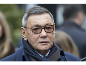 Interim President of the International Boxing Association (AIBA) Gafur Rakhimov attends a wreath laying ceremony at the Tomb of the Unknown Soldier in Moscow, Russia, Thursday, Nov.1, 2018.  With boxing's Olympic future on the line, one-time Olympic silver medalist from Kazakhstan, Serik Konakbayev, will fight to save his sport, running against Interim President Rakhimov, as candidates in the upcoming presidential vote Saturday Nov. 3, at AIBA, the amateur boxing federation.