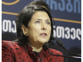 Salome Zurabishvili, former Georgian Foreign minister and presidential candidate, speaks during a news briefing dedicated to the results of the presidential election at her campaign headquarter in Tbilisi, Georgia, Wednesday, Nov. 28, 2018. Two of Georgia's former foreign ministers are facing off against each other Wednesday in a tight runoff that will mark the last time Georgians elect their head of state by popular vote.