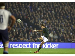 South Africa's Handre Pollard kicks the ball to convert a try during the rugby union international match between Scotland and South Africa at Murrayfield stadium, in Edinburgh, Scotland, Saturday, Nov. 17, 2018.