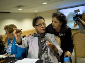 Margarette May Macaulay, center, president of the Inter-American Commission on Human Rights, attends a press conference, in Rio de Janeiro, Brazil, Monday, Nov. 12, 2018. The delegation of the Inter-American Commission on Human Rights visited Brazil from November 5 to 12 to monitor the enforcement of human rights in eight states.