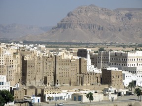 FILE - This Dec. 7, 2007 file photo, shows the historical city of Shibam in Hadramut province, Yemen. A prominent Yemeni rights group has documented heavy damage to at least 34 archaeological sites from the fighting and airstrikes over the past four years. In a report released Thursday, Nov. 15, 2018, the Mawatana Organization for Human Rights said that it collected testimonies from over 75 people working at the archaeological sites and monuments that came under attack since mid-2014.