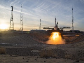 In this handout provided by NASA, a Soyuz booster rocket launches the Soyuz MS-11 spacecraft from the Baikonur Cosmodrome on December 3, 2018 in Baikonur, Kazakhstan.