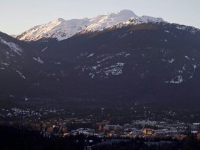 The village of Whistler, B.C. is seen as the sun sets on the snow capped mountains Friday, Feb. 3, 2012.