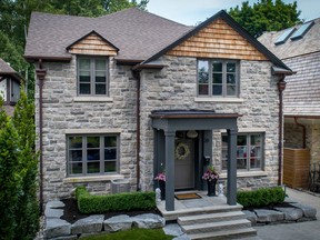 The front of the house is traditional, while the interior has been modernized.