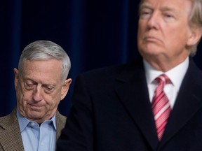 In this file photo taken on January 6, 2018 U.S. President Donald Trump, alongside Secretary of Defense Jim Mattis, speaks during a retreat with Republican lawmakers and members of his Cabinet at Camp David in Thurmont, Maryland.