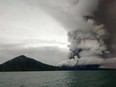 This picture taken on December 26, 2018 shows the Anak (Child) Krakatoa volcano erupting, as seen from a ship on the Sunda Straits.