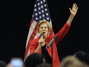 In this file photo taken on October 13, 2018 U.S. Senator Elizabeth Warren (D-MA) addresses a town hall meeting in Roxbury, Massachusetts.