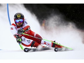 Austria's Marcel Hirscher speeds down the course during a men's World Cup Giant Slalom, in Alta Badia, Italy, Sunday, Dec. 16, 2018.