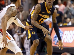 Murray State guard Ja Morant (12) works around Auburn guard Bryce Brown (2) during the first half of an NCAA college basketball game, Saturday, Dec. 22, 2018, in Auburn, Ala.