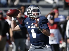 Nevada quarterback Ty Gangi (6) throws down field in the first half of the Arizona Bowl NCAA college football game against Arkansas State, Saturday, Dec. 29, 2018, in Tucson, Ariz.