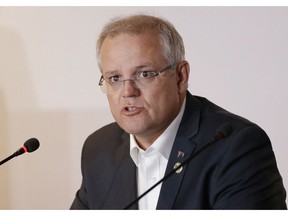 FILE - In this Nov. 18, 2018, file photo, Australian Prime Minister Scott Morrison speaks during the APEC 2018 meetings in Port Moresby, Papua New Guinea. Australia has decided to formally recognize west Jerusalem as Israel's capital, but won't move its embassy until there's a peace settlement between Israel and Palestinians, Prime Minister Morrison announced Saturday.