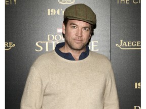 FILE - In this Nov. 1, 2016 file photo, Michael Weatherly attends a special screening of "Doctor Strange" at AMC Empire 25 in New York. CBS reached a $9.5 million confidential settlement last year with actress Eliza Dushku after on-set sexual comments from Weatherly, star of the network's show "Bull," made her uncomfortable. CBS confirmed the settlement Thursday, Dec. 13, 2018. Weatherly told the New York Times in an email that he was simply mocking comments in the script to Dushku, and was mortified and apologized when he learned she was uncomfortable.