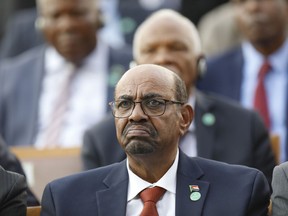 FILE - In this July 9, 2018 file photo, Sudan's President Omar Bashir attends a ceremony for Turkey's President Recep Tayyip Erdogan, at the Presidential Palace in Ankara, Turkey. An umbrella of independent professional unions on Sunday, Dec. 30, 2018 is calling on people to march on the presidential palace in Sudan's capital, Khartoum, to demand that autocratic President Omar Bashir step down.