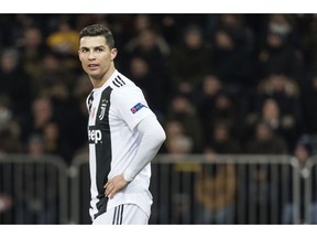 Cristiano Ronaldo reacts during the Champions League group H soccer match between Switzerland's BSC Young Boys Bern and Italy's Juventus Football Club Turin, at the Stade de Suisse in Bern, Switzerland, Wednesday, Dec. 12, 2018.