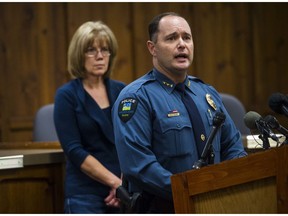 FILE - In this undated file photo, Woodland Park Police Chief Miles De Young answers questions about the disappearance of resident Kelsey Berreth, 29, while her mother, Cheryl Berreth, stands in the background during a news conference at City Hall in Woodland Park, Colo. Kelsey Berreth's disappearance has mystified her family and the Colorado police leading a multi-state search for the missing mother of a one-year-old daughter. Berreth was last spotted on Thanksgiving, Nov. 22, 2018, when a surveillance camera recorded the 29-year-old woman entering a grocery store near her Colorado home.