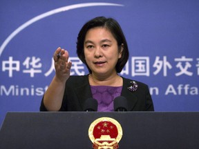 China's state media say a Canadian charged with smuggling drugs will be in court for an appeal on Saturday. Chinese foreign ministry spokeswoman Hua Chunying gestures during a press briefing at the Ministry of Foreign Affairs building in Beijing on Sept. 15, 2017.