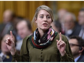 Minister of Tourism, Official Languages and La Francophonie Melanie Joly rises during Question Period in the House of Commons on Parliament Hill in Ottawa on November 26, 2018. Tourism Minister Melanie Joly's office says Canada and China have mutually agreed to postpone a closing ceremony next week to mark a year of tourism between the two countries.
