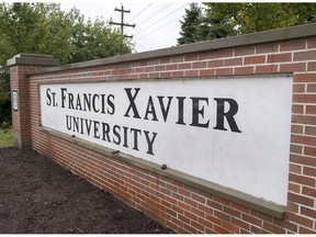 A sign marks one of the entrances to the St. Francis Xavier University campus in Antigonish, N.S., on September 28, 2018. The Nova Scotia government says it is providing more than $6-million in extra operating funding to two universities for the current fiscal year. The Department of Labour and Advanced Education says St. Francis Xavier University in Antigonish is getting an additional $3.95-million, while the University of King's College in Halifax will get an extra $2.2-million.