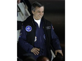 Canadian astronaut Robert Thirsk smiles as he arrival at the Star City, outside Moscow, Russia, Wednesday, Dec. 2, 2009. The Canadian Space Agency wants to hire former astronaut Thirsk to help it figure out how to contribute medical expertise to a human mission to Mars.