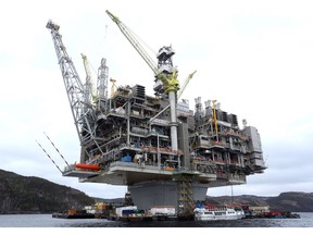 The Hebron Platform, anchored in Trinity Bay, N.L., is shown on April 18, 2017. A dramatic economic turnaround is being predicted for Newfoundland and Labrador next year. The Conference Board of Canada says it is expected to lead the provinces in economic growth, thanks to offshore oil royalties.