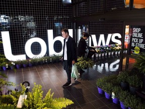 A man leaves a Loblaws store in Toronto on Thursday, May 3, 2018. Canadian grocers doubled down on transforming themselves into destinations for time-strapped shoppers this year, ramping up delivery options, acquiring meal kit companies and adding in-store eateries. Shifting consumer demands and tech titan Amazon's recent acquisition of Whole Foods Market are pressuring grocers to evolve, yet experts say it's only the beginning of a transformation in how Canadians shop for food.THE CANADIAN PRESS/Nathan Denette