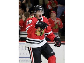 Chicago Blackhawks right wing Patrick Kane celebrates after scoring his goal against the Minnesota Wild during the first period of an NHL hockey game Thursday, Dec. 27, 2018, in Chicago.