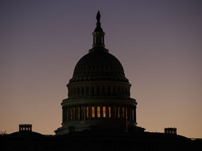 The U.S. Capitol Building Dome is seen before the sun rises in Washington, Tuesday, Dec. 18, 2018.