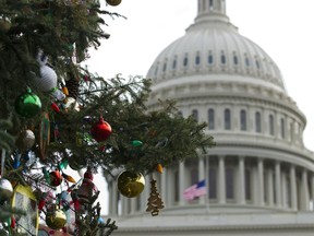 The Capitol Christmas tree decorations are seen outside of The U.S. Capitol in Washington, Friday, Dec. 21, 2018. Republican-led House approved funding for President Donald Trump's border wall in legislation that pushes the government closer to a partial government shutdown. The bill now goes to the Senate.