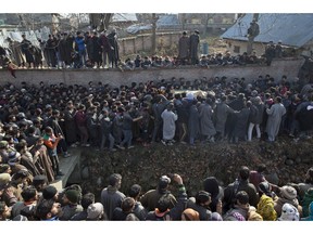 Kashmiri villagers carry the body of Zahoor Ahmed, a soldier turned rebel, during his funeral in Pulwama, south of Srinagar, Indian controlled Kashmir, Saturday, Dec. 15, 2018. At least seven civilians were killed and nearly two dozens injured when government forces fired at anti-India protesters in disputed Kashmir following a gunbattle that left three rebels and a soldier dead on Saturday, police and residents said.