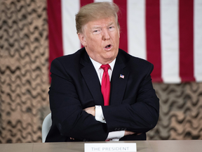 U.S. President Donald Trump speaks at a military briefing during an unannounced trip to Al Asad Air Base in Iraq on Dec. 26, 2018.
