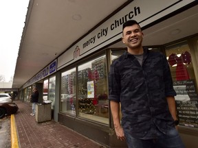Pastor Chris Yu stands in front of the Mercy City Church in a strip mall in Toronto on Friday December 14, 2018.