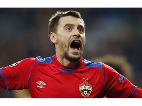 CSKA defender Georgi Schennikov celebrates after scoring his side's second goal during the Champions League, Group G soccer match between Real Madrid and CSKA Moscow, at the Santiago Bernabeu stadium in Madrid, Spain, Wednesday Dec. 12, 2018.